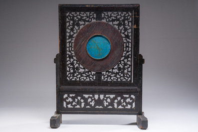 A reticulated Chinese wooden table screen with a Japanese cloisonn&eacute; dish, 19th C.