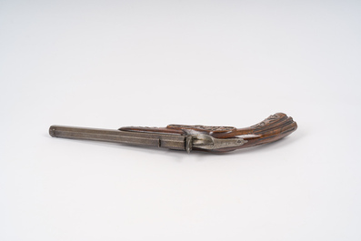 A Li&egrave;ge Flobert salon pistol with sculpted floral design, 19th C.
