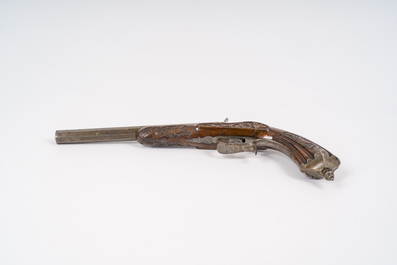 A Li&egrave;ge Flobert salon pistol with sculpted floral design, 19th C.