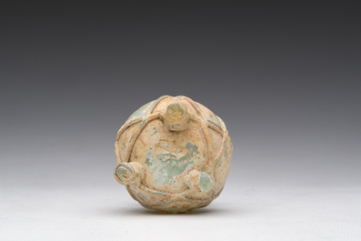 A Roman peel green glass tripod amphoriskos, Eastern Roman Empire, 5th C.