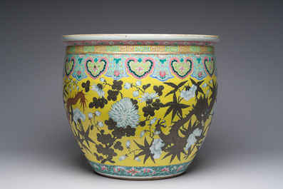 A Chinese famille rose Dayazhai style fish bowl with dragons among blossoming branches, 19th C.