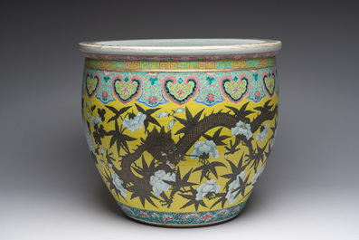 A Chinese famille rose Dayazhai style fish bowl with dragons among blossoming branches, 19th C.