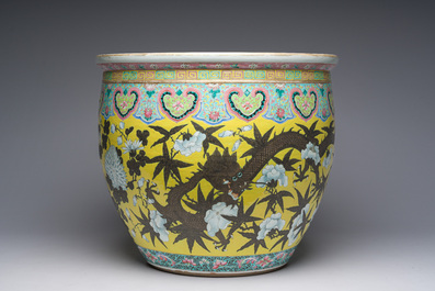 A Chinese famille rose Dayazhai style fish bowl with dragons among blossoming branches, 19th C.