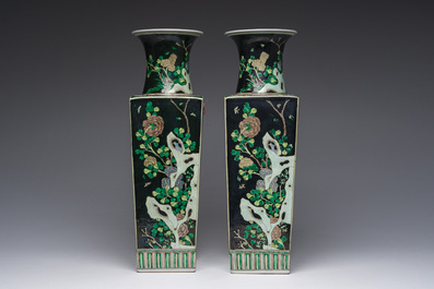 A pair of Chinese square famille noire vases with floral design, Kangxi mark, 19th/20th C.