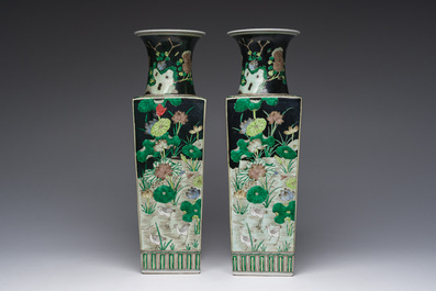 A pair of Chinese square famille noire vases with floral design, Kangxi mark, 19th/20th C.