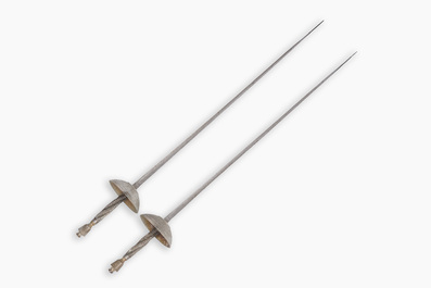 A pair of Belgian decorative &eacute;p&eacute;es with twisted handles and engraved floral design on the occasion of the fencing gala in Beauraing, dated 1899