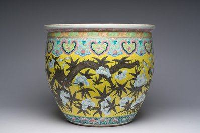 A Chinese famille rose Dayazhai style fish bowl with dragons among blossoming branches, 19th C.