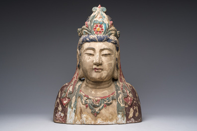 A large Chinese polychromed wooden bust of Buddha, 20th C.