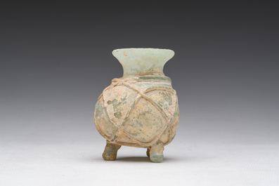 A Roman peel green glass tripod amphoriskos, Eastern Roman Empire, 5th C.
