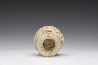 A Roman peel green glass tripod amphoriskos, Eastern Roman Empire, 5th C.