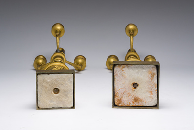 A pair of French Empire gilt and patinated bronze three-light candelabre, 19th C.