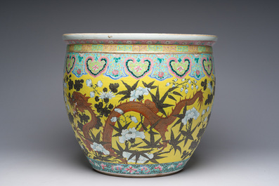 A Chinese famille rose Dayazhai style fish bowl with dragons among blossoming branches, 19th C.