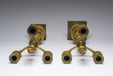 A pair of French Empire gilt and patinated bronze three-light candelabre, 19th C.