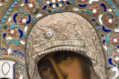 A Russian orthodox 'Virgin Mary Tricherousa (the three-handed)' icon with partly enamelled brass oklad or riza, 19th C.