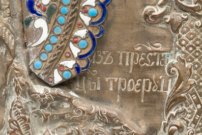 A Russian orthodox 'Virgin Mary Tricherousa (the three-handed)' icon with partly enamelled brass oklad or riza, 19th C.