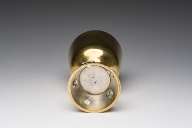 A Gothic revival gilt silver chalice with cabochons and accompanying paten, 925/000, 20th C.