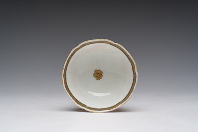 A Chinese iron-red and gilt 'Sanguozhi yanyi' cup and saucer, Yongzheng