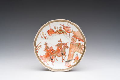 A Chinese iron-red and gilt 'Sanguozhi yanyi' cup and saucer, Yongzheng