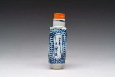 A Chinese blue, white and copper-red snuff bottle with figurative design, 19th C.