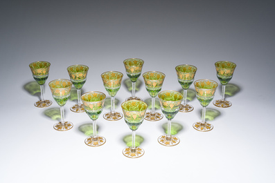 Twelve partly green-coloured overlay crystal cut white wine glasses with gilt grape design, model 'Pampre d'or', Val Saint Lambert, 20th C.