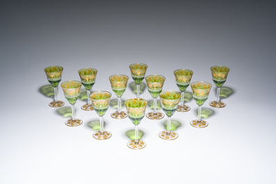 Twelve partly green-coloured overlay crystal cut white wine glasses with gilt grape design, model 'Pampre d'or', Val Saint Lambert, 20th C.