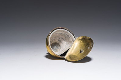 A Flemish silver 'Golgotha' ex-voto, a brass and silver 'Lamb of God' holy water font and a relic of Marg.-Marie Alacoque with filigree, 18th/19th C.