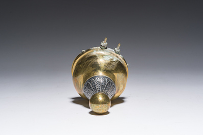 A Flemish silver 'Golgotha' ex-voto, a brass and silver 'Lamb of God' holy water font and a relic of Marg.-Marie Alacoque with filigree, 18th/19th C.