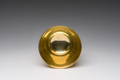 A Gothic revival gilt silver chalice with cabochons and accompanying paten, 925/000, 20th C.