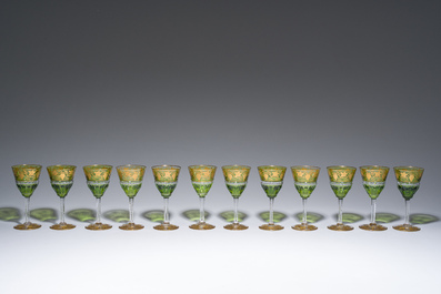 Twelve partly green-coloured overlay crystal cut white wine glasses with gilt grape design, model 'Pampre d'or', Val Saint Lambert, 20th C.