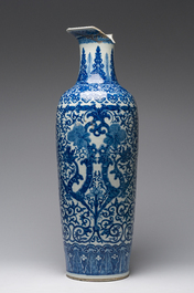 A pair of Chinese famille rose vases and a tall blue and white vase, 19th/20th C.