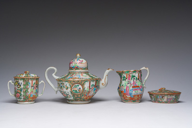 A Chinese 20-piece Canton famille rose tea service with floral design and palace scenes, 19th C.