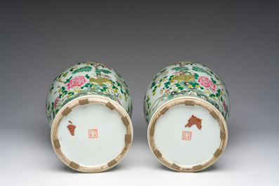 A pair of Chinese famille rose vases and a tall blue and white vase, 19th/20th C.