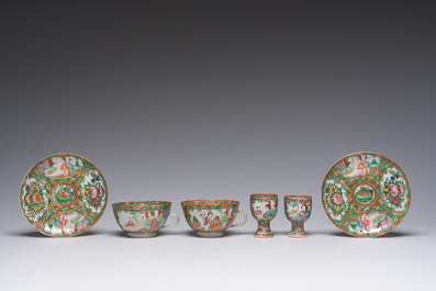 A Chinese 20-piece Canton famille rose tea service with floral design and palace scenes, 19th C.