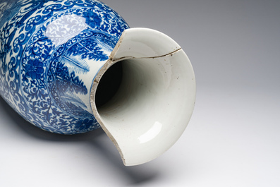 A pair of Chinese famille rose vases and a tall blue and white vase, 19th/20th C.