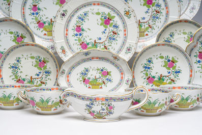 A large Hungarian Herend gilt and polychrome decorated porcelain set with floral design, 20th C.
