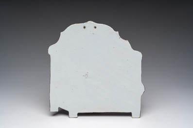 A polychrome Delftware birdcage plaque, Tichelaar, Makkum, Friesland, 19th C.