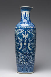 A pair of Chinese famille rose vases and a tall blue and white vase, 19th/20th C.