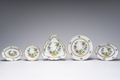 A large Hungarian Herend gilt and polychrome decorated porcelain set with floral design, 20th C.