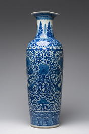 A pair of Chinese famille rose vases and a tall blue and white vase, 19th/20th C.