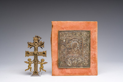 A Flemish parcel-gilt wooden 'soldier', a double-sided bronze cross, a Russian orthodox travel icon and a carved stone box and cover, 16th C. onwards