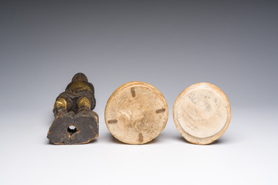 A Flemish parcel-gilt wooden 'soldier', a double-sided bronze cross, a Russian orthodox travel icon and a carved stone box and cover, 16th C. onwards
