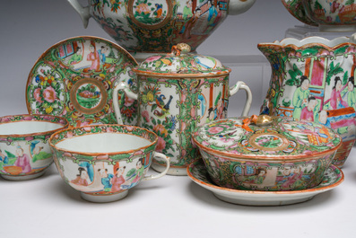 A Chinese 20-piece Canton famille rose tea service with floral design and palace scenes, 19th C.