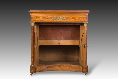 A French Empire style gilt bronze mounted two-door mahogany cabinet with a green marble top, 19th C.