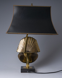 A Hollywood Regency gilt brass 'pharaon' table lamp, Deknudt, Kortrijk, and four Hollywood Regency style pineapples, 20th C.