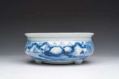 A Chinese blue and white tripod censer with figures in a landscape, 19th C.