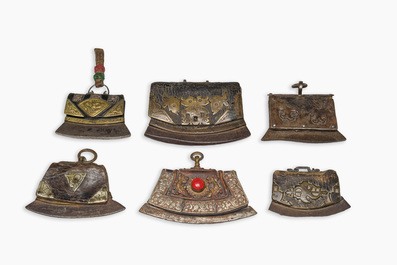 Six Tibetan leather and bronze fire flint purses or chuk muk, 19th C.