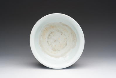 A Chinese blue and white tripod censer with figures in a landscape, 19th C.