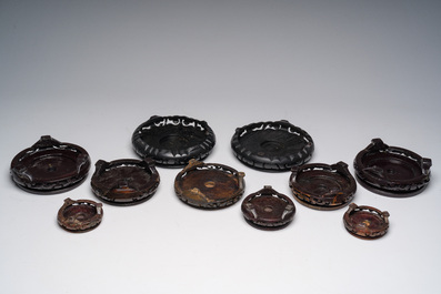 Nine Chinese cloisonn&eacute; vases and a covered bowl, 20th C.