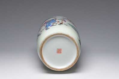 A Chinese famille rose rouleau vase with immortals in a garden, Qianlong mark, 20th C.