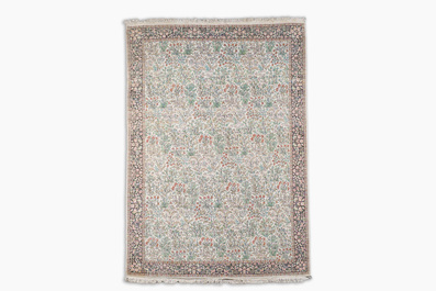 An Indian silk Kashmir rug with floral design, 20th C.